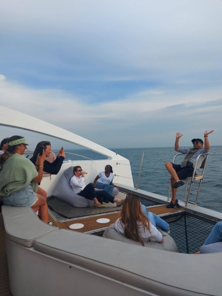 People having fun on the catamaran bow